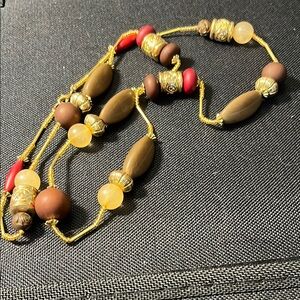 Vintage handmade necklace with lucite beads and gold-tone beads